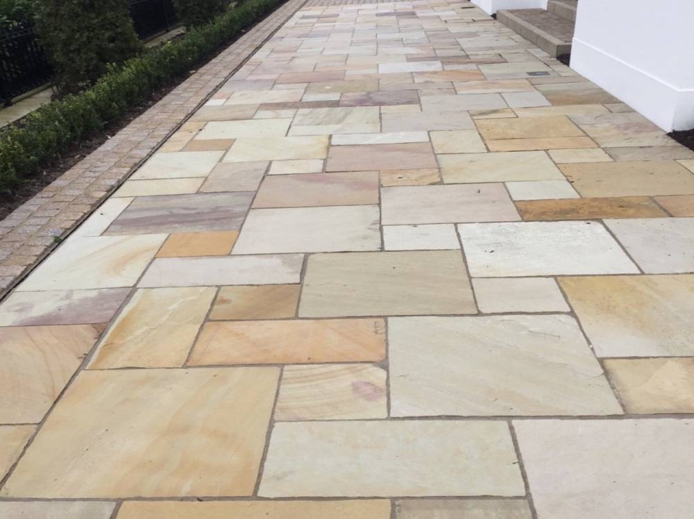 Indian sandstone path with block paving border edging