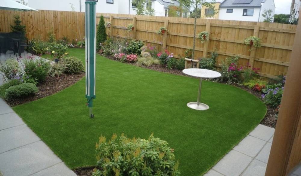 Landscaped garden with lawn and flower beds