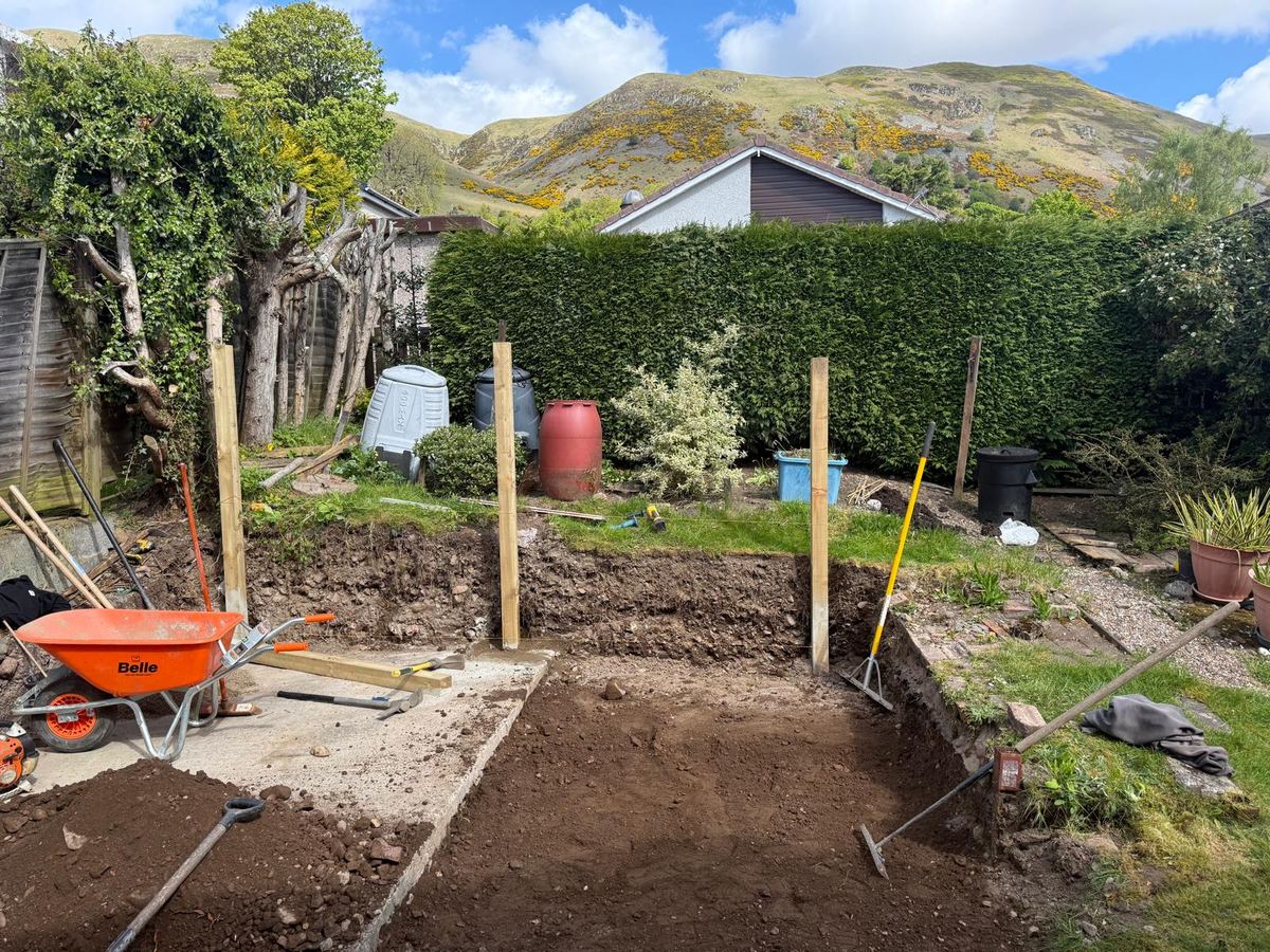 Garden excavated and set out for a porcelain patio and sleeper walls